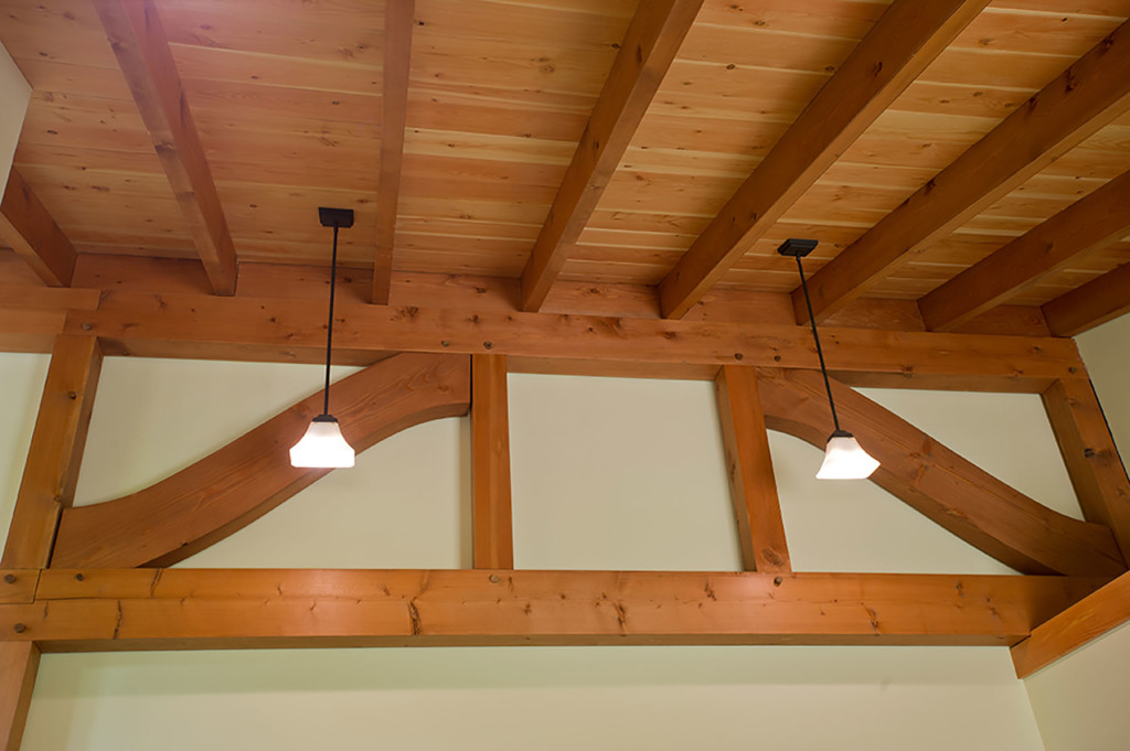 Timber frame parallel chord truss in Wing Creek home