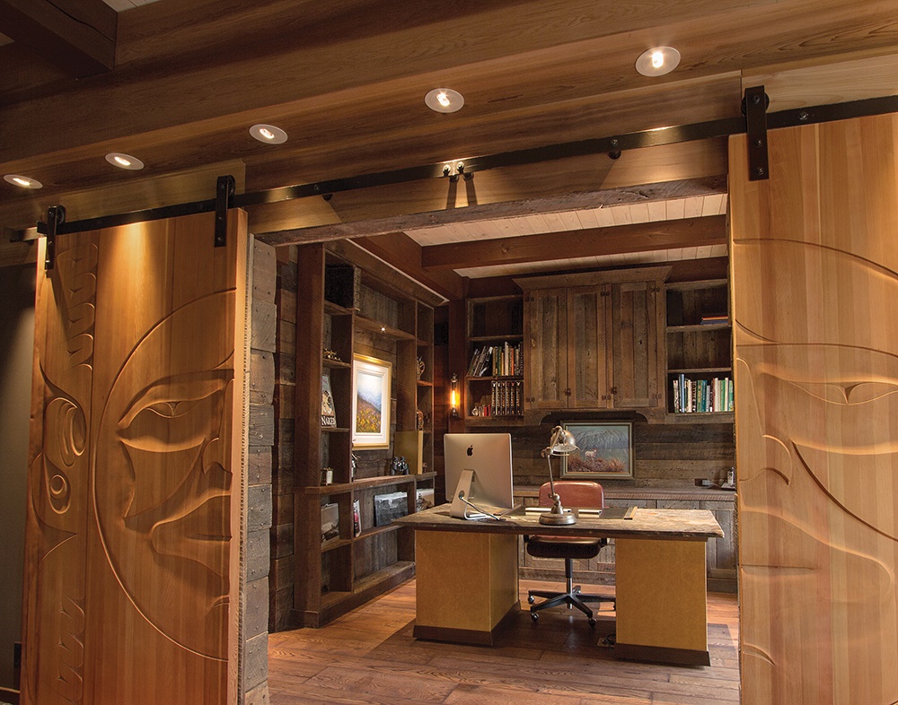 Timber home, Riverside Native art carved doors