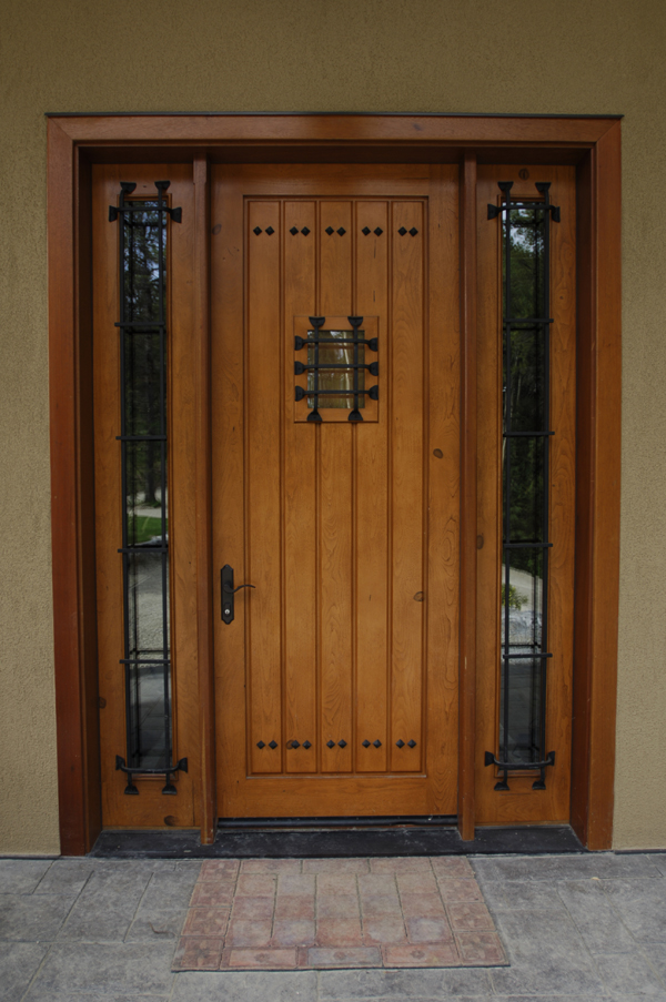 Timber frame home speakeasy entry door