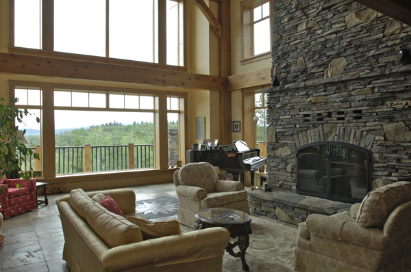 Bragg Creek timber home, great room with stone fireplace