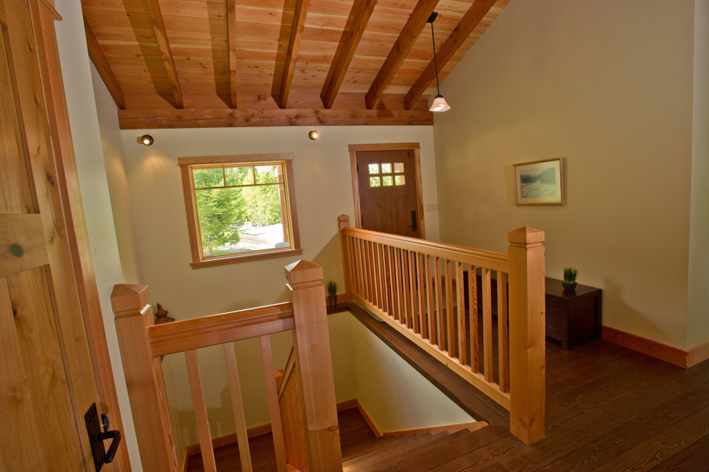 Timber framed home--custom stairs