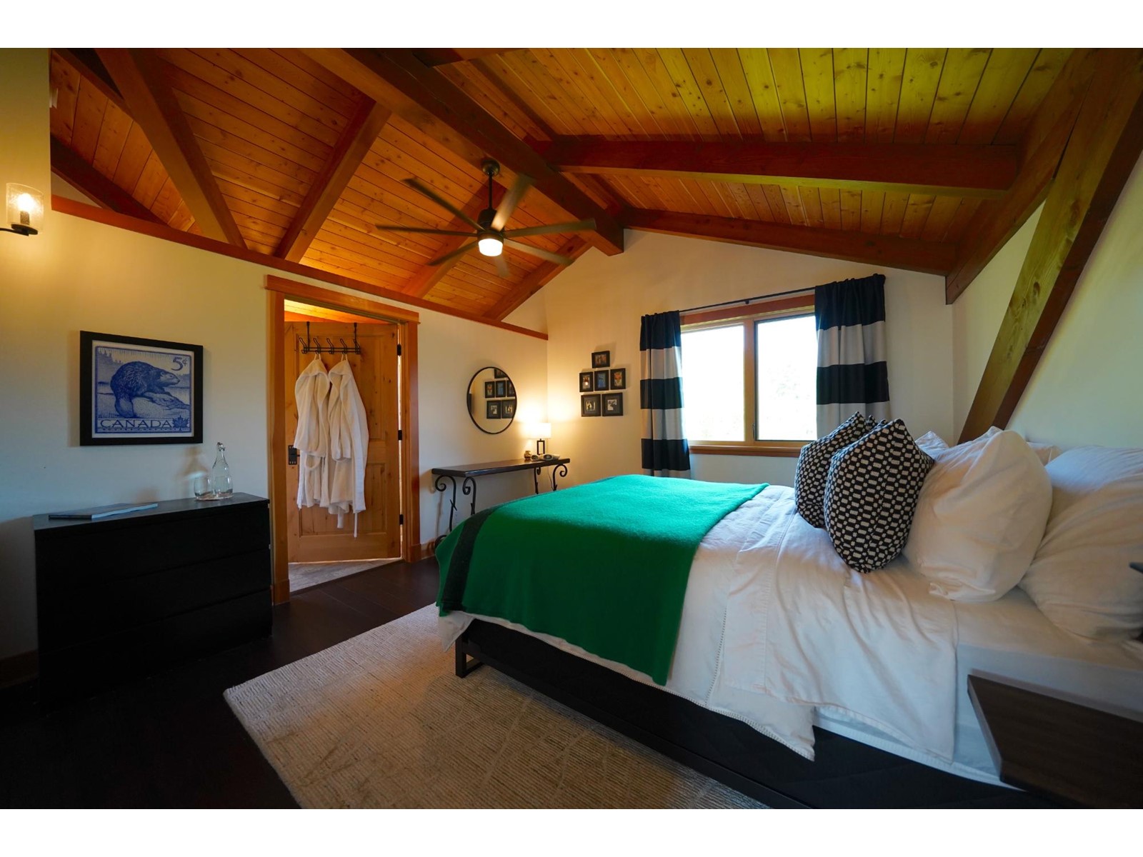 The entrance to a timber-frame home with painted walls.