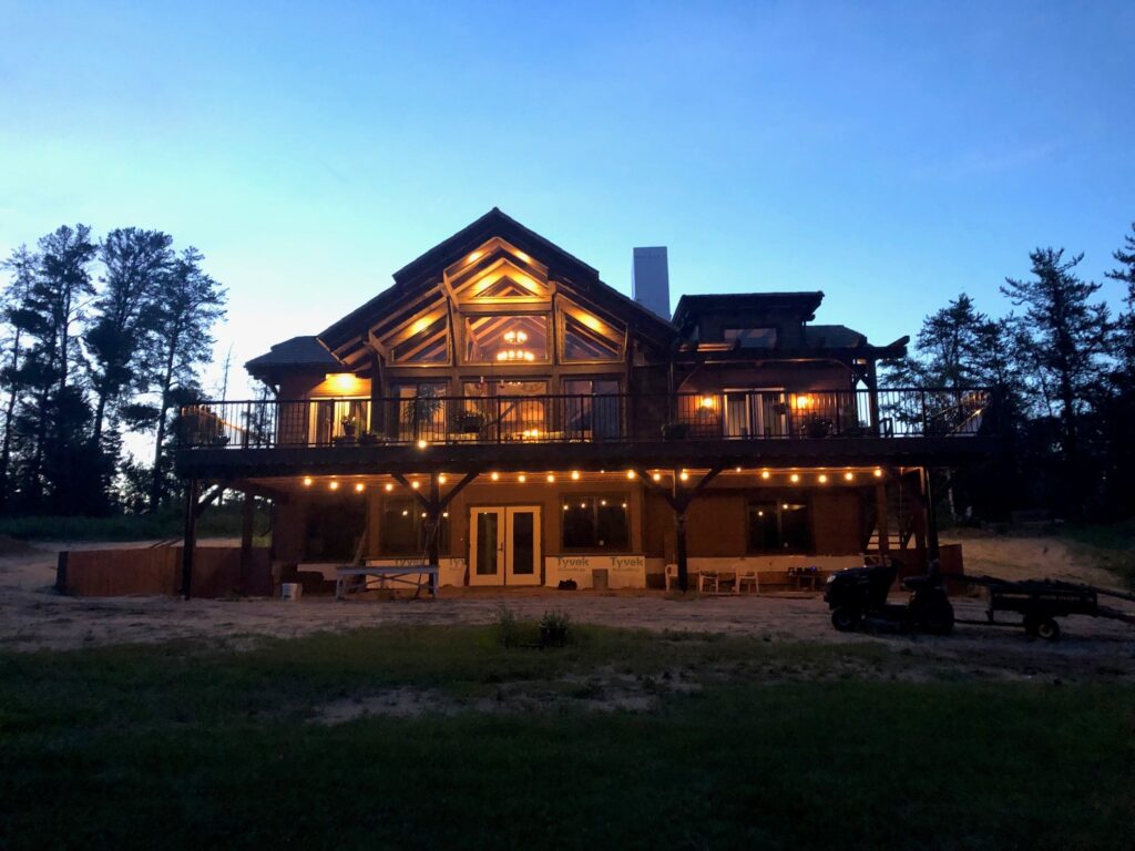 timber frame exterior at dusk