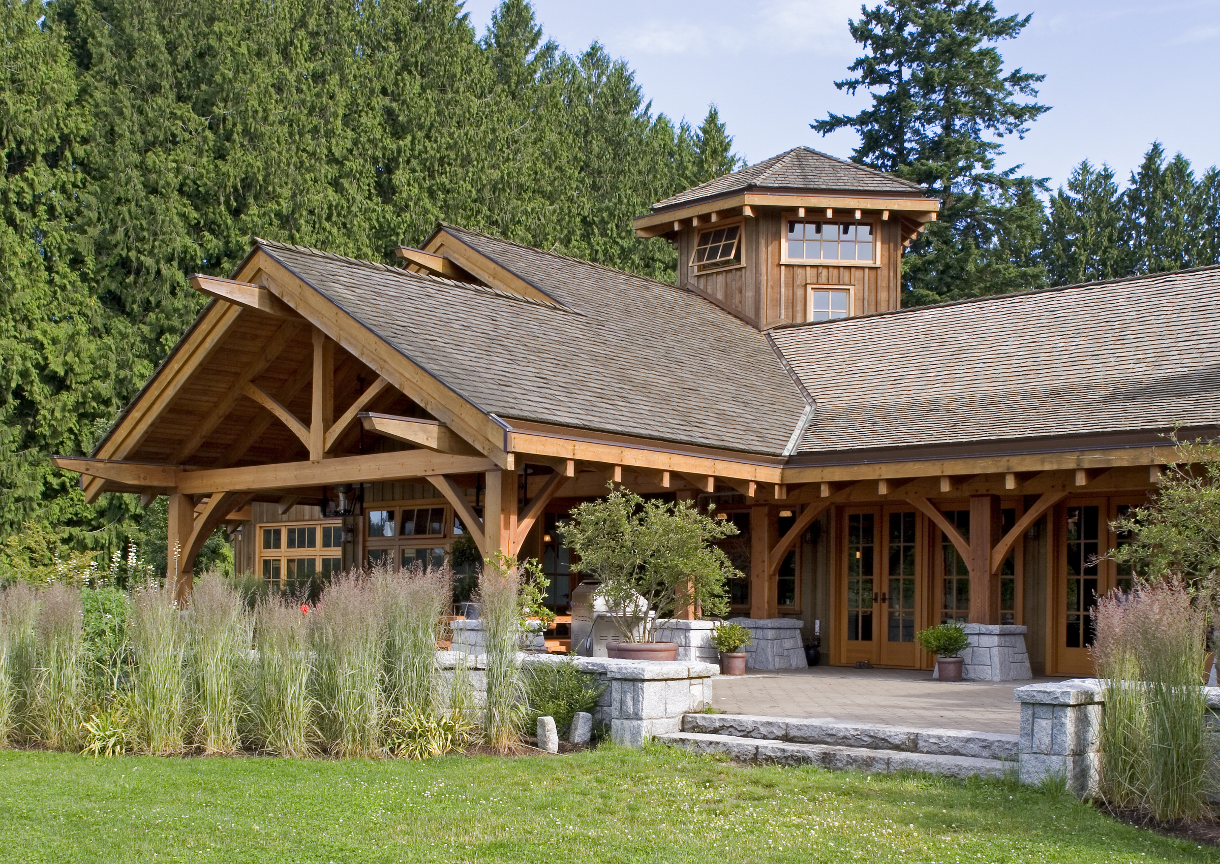 Custom timber frame home showcasing natural wood aesthetics and open floor plan.